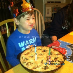 Sam celebrating hos birthday with a gluten-free apple pie